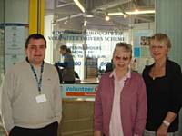 Volunteer Centre staff outside the office at the Bus Station